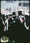 Graduates Helping Each Other with Hoods, Commencement 1972 by Montclair State College